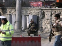 Afghan security personnel stand near the site of a suicide attack in Kabul, Afghanistan, Monday, Dec. 25, 2017. A spokesman for the interior ministry says that the bomber blew himself up Monday near an office of the country's intelligence service. (AP Photo/Rahmat Gul)