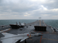 This photo taken on December 23, 2016 shows Chinese J-15 fighter jets being launched from the deck of the Liaoning aircraft carrier during military drills in the Yellow Sea, off China's east coast. Taiwan's defence minister warned on December 27 that enemy threats were growing daily after China's aircraft carrier and a flotilla of other warships passed south of the island in an exercise as tensions rise. / AFP / STR / China OUT (Photo credit should read STR/AFP/Getty Images)