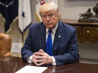 FILE: U.S. President Donald Trump listens during a meeting with congressional leadership in the Roosevelt Room of the White House in Washington, D.C., U.S., on Tuesday, Nov. 28, 2017. Trump will dominate the Davos forum as no U.S. leader has before: a provocateur-in-chief practiced at tweaking the elites wholl gather later this month to celebrate the global order he seems eager to tear down. Trump would be the first sitting American president to attend the meeting of bankers, corporate chiefs, academics and investors since Bill Clinton in January 2000. Our editors select the best archive images from Davos and the Trump Presidency. Photographer: Kevin Dietsch/Pool via Bloomberg