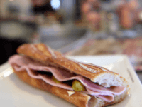 GettyImages-465252312 A picture taken on March 4, 2015 in Paris shows a ham sandwich on the zinc counter of a bar. The price of the 'Jambon-Beurre' sandwich (ham and butter), eaten a billion times in France in 2014, continued to rise but slower than others catering products, according to a price …