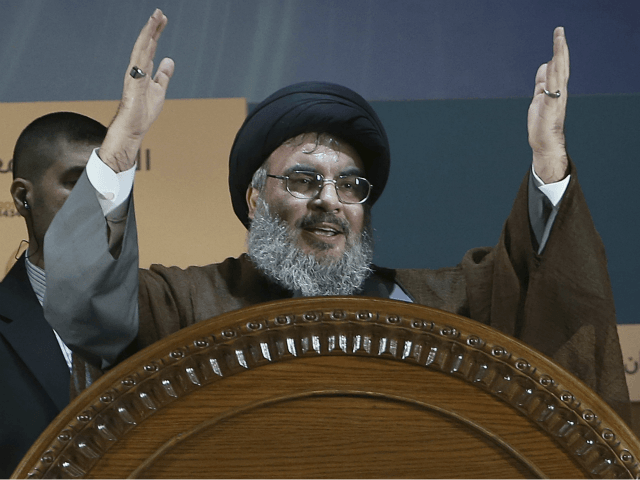 In this Aug. 2, 2013, file photo, Hezbollah leader Sheikh Hassan Nasrallah gestures during a rally to mark Jerusalem day or Al-Quds day, in a southern suburb of Beirut, Lebanon. The leader of Lebanon's Hezbollah on Monday, Nov. 20, 2017, categorically denied accusations that his group is sending weapons to Yemen or that it was responsible for a ballistic missile fired by Shiite rebels in Yemen that was intercepted near the Saudi capital, Riyadh. (AP Photo/Hussein Malla, File)