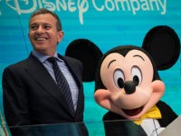 NEW YORK, NY - NOVEMBER 27: (L to R) Chief executive officer and chairman of The Walt Disney Company Bob Iger and Mickey Mouse look on before ringing the opening bell at the New York Stock Exchange (NYSE), November 27, 2017 in New York City. Disney is marking the company's 60th anniversary as a listed company on the NYSE. (Drew Angerer/Getty Images)