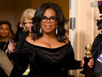 BEVERLY HILLS, CA - JANUARY 07: Oprah Winfrey arrives with the Cecil B. DeMille Award in the press room during The 75th Annual Golden Globe Awards at The Beverly Hilton Hotel on January 7, 2018 in Beverly Hills, California. (Photo by Kevin Winter/Getty Images)