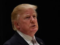 US President Donald Trump speaks to reporters at Trump International Golf Club in West Palm Beach on January 14, 2018. / AFP PHOTO / Nicholas Kamm (Photo credit should read NICHOLAS KAMM/AFP/Getty Images)