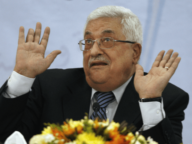 Palestinian President Mahmoud Abbas gestures as he speaks during a meeting of the Central Committee of the Palestine Liberation Organization (PLO), in the West Bank city of Ramallah, Wednesday, July 27, 2011. Abbas said Wednesday he will ask the United Nations to endorse Palestinian independence this fall even if negotiations restart with Israel. (AP Photo/Majdi Mohammed)