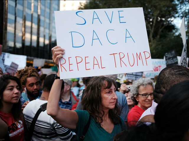 NEW YORK, NY - AUGUST 30: Hundreds of immigration advocates and supporters attend a rally and march to Trump Tower in support of the Deferred Action for Childhood Arrivals program also known as DACA on August 30, 2017 in New York City. Immigrants and advocates across the country are waiting to hear President Donald Trump's decision on whether he will keep DACA which allows young people who immigrated to the U.S. as children to temporarily escape deportation and receive other benefits, started under President Barack Obama in 2012. (Photo by Spencer Platt/Getty Images)