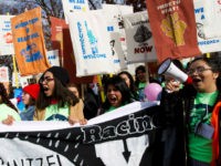 Demonstrators march during an immigration rally in support of the Deferred Action for Childhood Arrivals (DACA), and Temporary Protected Status (TPS), programs, on Capitol Hill in Washington, Wednesday, Dec. 6, 2017. ( AP Photo/Jose Luis Magana)