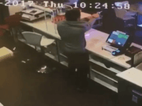 WATCH: Cafe Owner Takes Away Gun, Opens Fire on Suspect