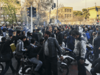 In this photo of Iranian protests taken by an individual not employed by the Associated Press and obtained by the AP outside Iran, demonstrators gather to protest against Iran's weak economy, in Tehran, Iran, Saturday, Dec. 30, 2017. A wave of spontaneous protests over Iran's weak economy swept into Tehran on Saturday, with college students and others chanting against the government just hours after hard-liners held their own rally in support of the Islamic Republic's clerical establishment. (AP Photo)