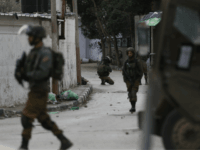 Israeli troops patrol the streets of the West Bank city of Jenin, Thursday, Jan. 18, 2018. Israeli police say special forces killed a Palestinian gunman in the West Bank who allegedly killed an Israeli in a drive-by shooting earlier this month. (AP Photo/Majdi Mohammed)