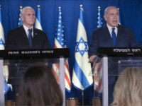 U.S. Vice President Mike Pence, left, listens as Israel's Prime Minister Benjamin Netanyahu delivers a statement in the Prime Minister's residence in Jerusalem, Monday, Jan. 22, 2018. (AP Photo/Ariel Schalit, Pool)