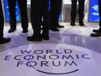 FILE: A WEF logo sits on the stage as panelists talk ahead of a panel session at the World Economic Forum (WEF) in Davos, Switzerland, on Friday, Jan. 22, 2016. President Donald Trump will dominate the Davos forum as no U.S. leader has before: a provocateur-in-chief practiced at tweaking the elites wholl gather later this month to celebrate the global order he seems eager to tear down. Trump would be the first sitting American president to attend the meeting of bankers, corporate chiefs, academics and investors since Bill Clinton in January 2000. Our editors select the best archive images from Davos and the Trump Presidency. Photographer: Jason Alden/Bloomberg via Getty Images