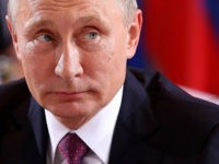BERLIN, GERMANY - OCTOBER 19: Russian President Vladimir Putin attends a meeting to discuss the Ukrainian peace process at the German federal Chancellery on October 19, 2016 in Berlin, Germany. The leaders of Russia, Ukraine, France and Germany, known as the Normandy Four, met in Berlin to discuss implementation of the peace plan known as the Minsk Protocol, a roadmap for resolving the conflict in Ukraine after Russian forces invaded in 2014 and annexed the peninsula of Crimea. The United States has threatened renewed sanctions on Russia if the country did not either implement the plan in the coming months or arrive at a plan on how to do so. (Photo by Adam Berry/Getty Images)