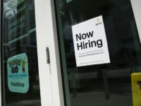 Even with the US economy in its eighth year of recovery, and solid hiring pushing the unemployment rate to a 17-year low, wage gains have been far more sluggish than expected. This file photo taken on July 7, 2017 shows a sign at a Miami business