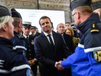 Macron visits Calais to preview toughened migrant policies Photo AP Photo