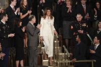 Why did Melania wear white? Some see hidden meanings