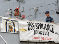US Navy's Pacific Fleet commander Admiral Harry Harris leaves after visiting the USS Spruance (DDG 111), Arleigh Burke-class guided-missile destroyer (background) which docked in Sembawang wharves in Singapore on January 22, 2014. Admiral Harris, the US Navy's most senior officer in the Pacific region, identified North Korea as its 'number one security concern'. AFP PHOTO/ROSLAN RAHMAN (Photo credit should read ROSLAN RAHMAN/AFP/Getty Images)