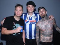 LOS ANGELES, CA - JUNE 12: (L-R) Musicians Mark Hoppus, Matt Skiba and Travis Barker of Blink-182 backstage as Bethesda Softworks shows off new video game experiences at its E3 Showcase and BE3 Plus event at the LA Hangar in Los Angeles, ahead of the Electronic Entertainment Expo (E3) happening at the Los Angeles Convention Center from June 14-16, on June 12, 2016 in Los Angeles, California. (Photo by Jonathan Leibson/Getty Images for Bethesda Softworks LLC)