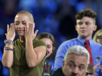 Marjory Stoneman Douglas High School student Emma Gonzalez wipes away tears during a CNN town hall meeting, Wednesday, Feb. 21, 2018, at the BB&T Center, in Sunrise, Fla. (Michael Laughlin/South Florida Sun-Sentinel via AP)