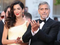 TOPSHOT - US actor George Clooney (R)and his wife British-Lebanese lawyer Amal Clooney arrive on May 12, 2016 for the screening of the film 'Money Monster' at the 69th Cannes Film Festival in Cannes, southern France / AFP PHOTO / Valery HACHE (Photo credit should read VALERY HACHE/AFP/Getty Images)