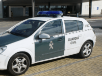 An cameraman films beside a Guardia Civil vehicle parked outside the emergency ward of the Torrevieja hospital on January 23, 2014 where 40-year-old Swiss citizen Katharina Katit-Staheli alledgely cut her 10 month old son's boy's throat with a knife and killed him before attempting to commit suicide today. The mother had been detained by Spanish authorities in a Torrevieja hospital who were following up on an arrest warrant issued by Zurich authorities after she allegedly took her child suffering from a brain abnormality without authorization from a specialist Swiss clinic and absconded to Spain. AFP PHOTO / MANUEL LORENZO (Photo credit should read MANUEL LORENZO/AFP/Getty Images)