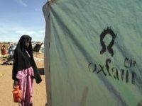 A Sudanese girl waits to use toilets set EL-FASHER, SUDAN: A Sudanese girl waits to use toilets set up by the British aid organization Oxfam in the Abu Shouk refugee camp, on the outskirts of El-Fasher in Sudan's northern Darfur region 30 November 204. Sudan today said it was reviewing a decision to expel the heads of Oxfam …