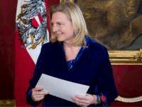 Austrian Foreign minister Karin Kneissl holds her letter of appointment during the inauguration ceremony of the new Austrian government at the Hofburg in Vienna, Austria, on December 18, 2017. Austria's president swore in Sebastian Kurz as head of a new coalition government involving Kurz's conservatives and the far-right, capping a year of successes for Europe's nationalists. / AFP PHOTO / VLADIMIR SIMICEK (Photo credit should read VLADIMIR SIMICEK/AFP/Getty Images)
