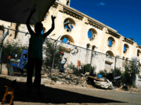 PORT-AU-PRINCE, HAITI - FEBRUARY 10: A child stands in front of a destroyed church in Port au Prince on February 10, 2018 in Port-au-Prince, Haiti. Haiti, the poorest country in the Western Hemisphere, is still reeling from President Donald Trump's comments about the Caribbean nation and his decision to revoke Temporary Protected Status (TPS) for Haitians living in America following the 2010 earthquake that claimed over 300,000 lives. Haiti is currently preparing for the start of Carnival on Sunday. (Photo by Spencer Platt/Getty Images)