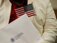 HIALEAH, FL - JANUARY 12: Marcel Cioffi, orginally from Venezuela, prepares to become an American citizen during a U.S. Citizenship & Immigration Services naturalization ceremony at the Hialeah Field Office on January 12, 2018 in Hialeah, Florida. 150 people from different countries around the world took part in the Oath of Allegiance. (Photo by Joe Raedle/Getty Images)