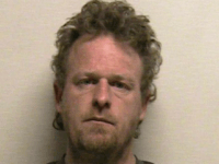 Concealed Permit Holder Pulls Gun, Stops Attack on Police Officer