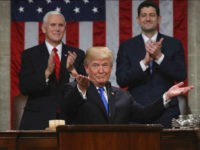 President Donald Trump gestures as delivers his first State of the Union address in the House chamber of the U.S. Capitol to a joint session of Congress Tuesday, Jan. 30, 2018 in Washington, as Vice President Mike Pence and House Speaker Paul Ryan applaud. (Win McNamee/Pool via AP)