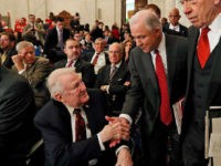 Attorney General-designate, Sen. Jeff Sessions, R-Ala., center, accompanied by Senate Judiciary Committee Chairman Sen. Charles Grassley, R-Iowa, right, reaches to shake hands with former Attorney General Edwin Meese III, as they arrive on Capitol Hill in Washington, Tuesday, Jan. 10, 2017, for Sessions confirmation hearing before the committee. (AP Photo/Alex Brandon)