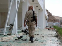 A fighter from the separatist Southern Transitional Council gather on February 25, 2018, at the site of two suicide car bombings that targeted the headquarters of an anti-terror unit the day before, in the southern Yemeni port of Aden. Five people, including security officers and a child, died in the blasts at the headquarters of an anti-terror unit in the Tawahi district, Aden security chief General Shallal al-Shae said. / AFP PHOTO / SALEH AL-OBEIDI (Photo credit should read SALEH AL-OBEIDI/AFP/Getty Images)