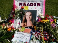 A memorial for Meadow Pollack, one of the victims of the Marjory Stoneman Douglas High School shooting, sits in a park in Parkland, Florida on February 16, 2018. A former student, Nikolas Cruz, opened fire at the Florida high school leaving 17 people dead and 15 injured. / AFP PHOTO / RHONA WISE (Photo credit should read RHONA WISE/AFP/Getty Images)