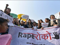 NEW DELHI, INDIA - FEBRUARY 13: Students along with the Swati Maliwal, chairperson of Delhi Commission for Women (DCW) protest against the increasing number of rape and other crimes against women at Delhi University, North Campus on February 13, 2018 in New Delhi, India. (Photo by Sushil Kumar/Hindustan Times via Getty Images)
