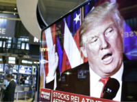 In this Nov. 9, 2016, file photo an image of President-elect Donald Trump appears on a television screen on the floor of the New York Stock Exchange. President Trump has maintained an uncharacteristic silence since the stock market took a nose dive, notable for a businessman president who regularly points to the rising market as evidence of the success of his presidency and economic policies. (AP Photo/Richard Drew, File)