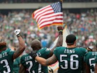 Philadelphia Eagles players stand during the National Anthem on October 8, 2017 in Philadelphia, Pennsylvania