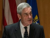 Special Counsel Robert Mueller, pictured in this August 8, 2013 file photo, charged 13 Russians for an alleged conspiracy to defraud the United States