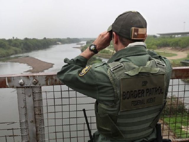 Border Patrol Agent in Laredo Patroling Rio Grande River - Getty Immages John Moore