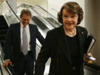 U.S. Sen. Dianne Feinstein (D-CA) and Sen. Jeff Flake (R-AZ) leave after a vote on Loretta Lynch to become the next U.S. Attorney General April 23, 2015 on Capitol Hill in Washington, DC. The Senate has confirmed the nomination with a vote of 56 to 43. (Photo by Alex Wong/Getty Images)