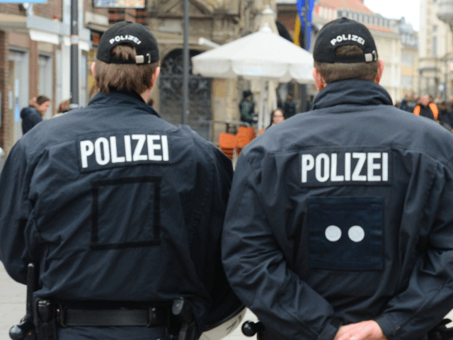 Police officers secure an area in the centre of Luebeck, northern Germany, where G7 foreign ministers will be received on April 14, 2015. The foreign ministers meet to discuss key global political and security issues ahead of a G7 summit to take place in June 2015 in southern Germany. The …
