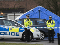 SALISBURY, ENGLAND - MARCH 06: Police officers man a cordon near a forensic tent (not pictured) where a man and woman had been found unconscious two days previosly, on March 6, 2018 in Salisbury, England. The man is believed to be Sergei Skripal, 66, who was granted refuge in the UK following a 'spy swap' between the US and Russia in 2010. The couple remain critically ill after being exposed to an 'unknown substance'. (Photo by Dan Kitwood/Getty Images)