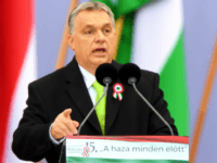 Hungarian Prime Minister Viktor Orban delivers a speech in front of the Hungarian Parliament in Budapest on March 15, 2018, during the official commemoration of the 170th anniversary of the 1848-1849 Hungarian revolution and independence war. Tens of thousands of supporters of Hungary's Prime Minister Viktor Orban took to the streets of Budapest on Thursday in a mass show of force before the elections on April 8. / AFP PHOTO / ATTILA KISBENEDEK STF (Photo credit should read ATTILA KISBENEDEK STF/AFP/Getty Images)