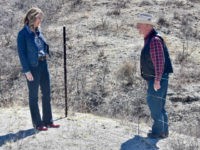 Republican U.S. Senate Candidate for Arizona Kelli Ward stands by the small barbed wire fence that serves as the border between the U.S. and Mexico. Rancher Jim Chilton crawled under it and stood on Mexican soil. (Penny Starr/Breitbart News)