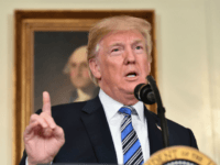 US President Donald Trump speaks about the spending bill during a press conference in the Diplomatic Reception Room at the White House on March 23, 2018. / AFP PHOTO / Nicholas Kamm (Photo credit should read NICHOLAS KAMM/AFP/Getty Images)