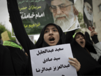 An Iranian hard line student chants as she holds the names of Bahraini Shiite Muslim protesters who were sentenced to death and life in prison by Bahraini military court outside the Bahrain embassy in Tehran on April 30, 2011, during a protest to commemorate the people who were killed in Bahrain uprising. AFP PHOTO/BEHROUZ MEHRI (Photo credit should read BEHROUZ MEHRI/AFP/Getty Images)