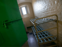 A cell is pictured inside Reading prison during an exhibition photocall at the prison in Reading, west of London on September 1, 2016. Having closed it's doors as a conventional prison in 2013, Reading Prison opens to the public for a major new project in which leading artists, performers and writers respond to the work of the prison's most famous inmate Oscar Wilde. / AFP / JUSTIN TALLIS (Photo credit should read JUSTIN TALLIS/AFP/Getty Images)