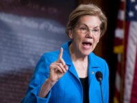 sen-elizabeth-warren-one-finger-3-18-getty UNITED STATES - MARCH 6: Sen. Elizabeth Warren, D-Mass., holds a news conference in the Capitol on banking deregulation legislation on Tuesday, March 6, 2018. (Photo By Bill Clark/CQ Roll Call)