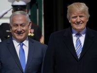 Israeli Prime Minister Benjamin Netanyahu, left, praised President Donald Trump's highly contentious decision to move the US embassy to Jerusalem, during a meeting at the White House