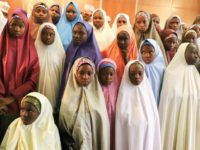 Freed Dapchi schoolgirls wait to meet Nigerian President Muhammadu Buhari, who has vowed to do 'everything in our power to bring Leah back safely'